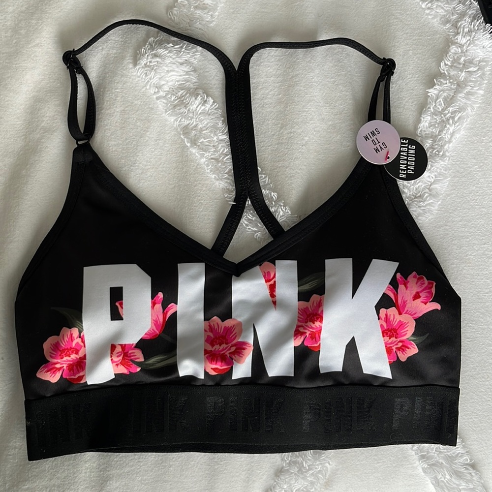 PINK SML bathing suit top turns into a sports bra. Black, pink, white & green.